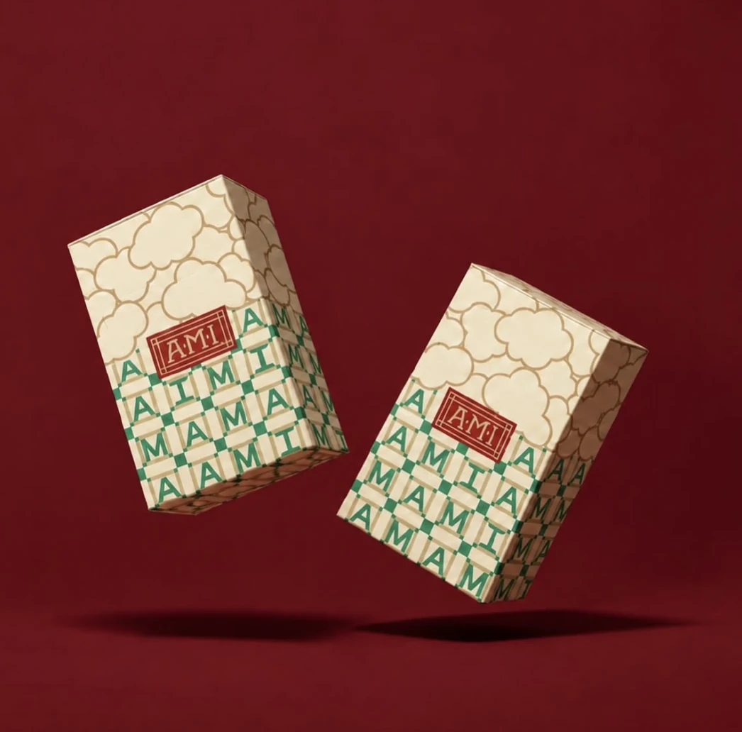 Two AMI patterned packages on a burgundy background