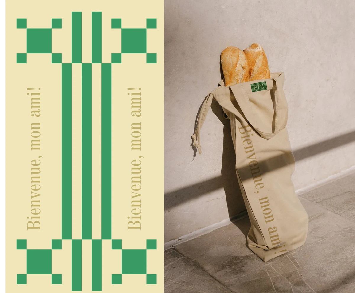 AMI striped menu beside a baguette in a natural fabric bag