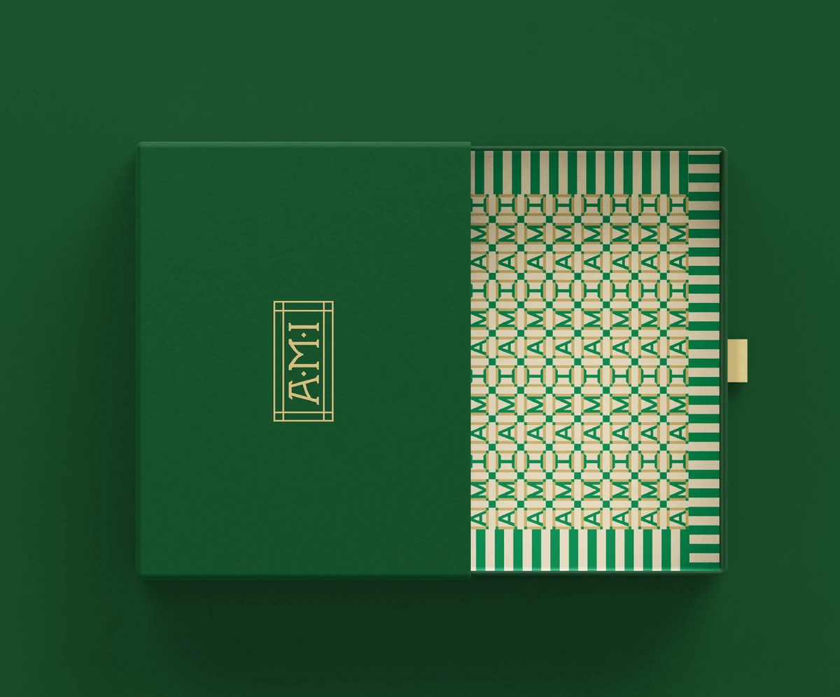 AMI deep green stationery with a cream patterned panel
